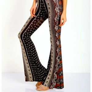 Novella royale flares black daisy paisley